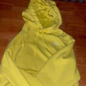 This is a nice small yellow Nike hoodie in good condition!
